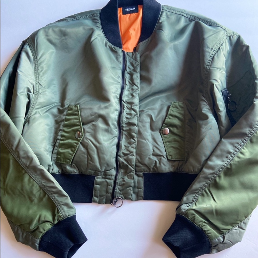 Never worn women’s green jackets.